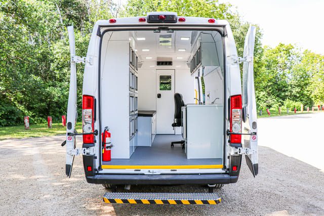 Mobile Medical Clinic Van from the rear with back doors wide open
