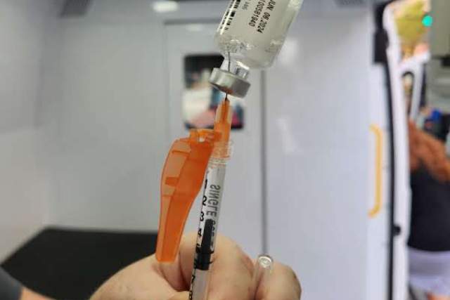 Vaccinations inside a mobile clinic van.