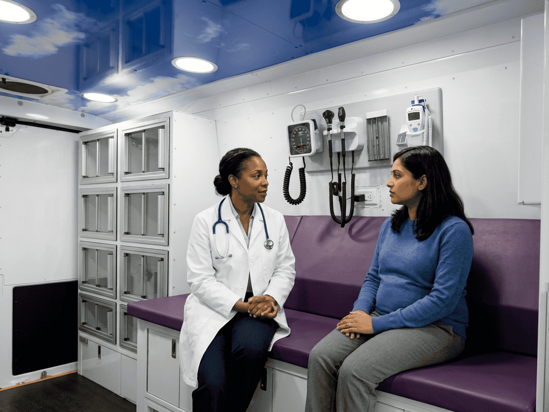 Doctor providing an OB-GYN consultation in a mobile healthcare setting